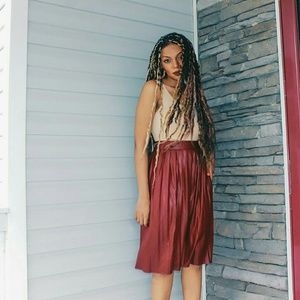 Pleated faux leather midi skirt